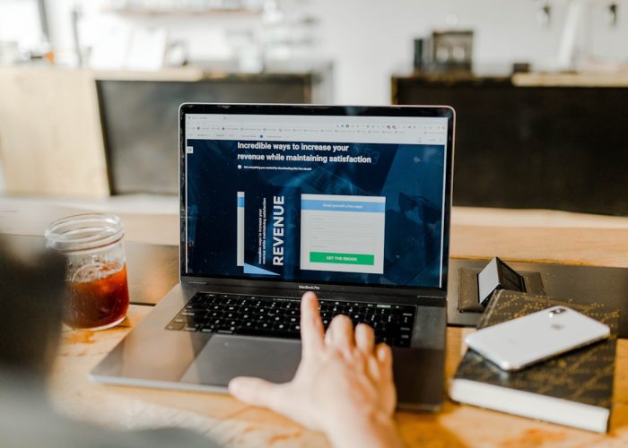 Professional managing an online campaign for a 360 marketing strategy