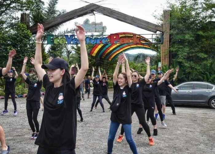 Employees taking part in an outdoor HRD Corp training activity