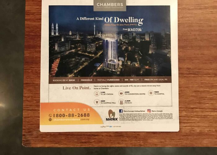 Custom table sticker printing featuring a Chambers Residence advertisement