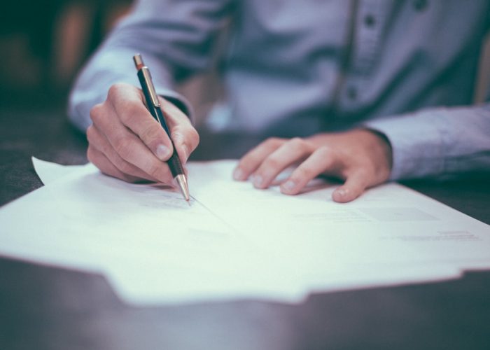 Professional reviewing and signing trademark intellectual property documents